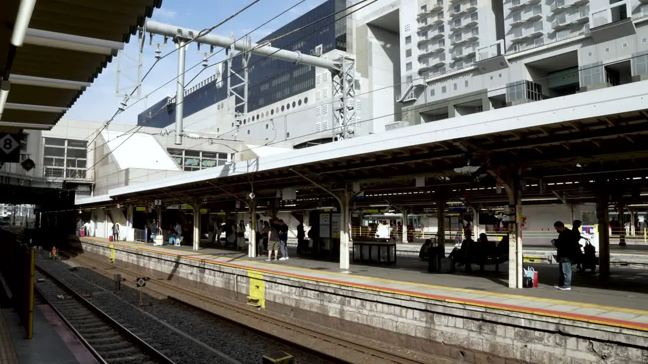 Local Train Platform At Kyoto Station On Sunny Day