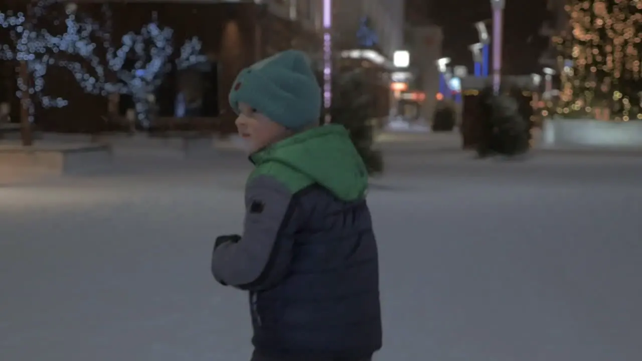 Boy running outdoor during Christmas holidays