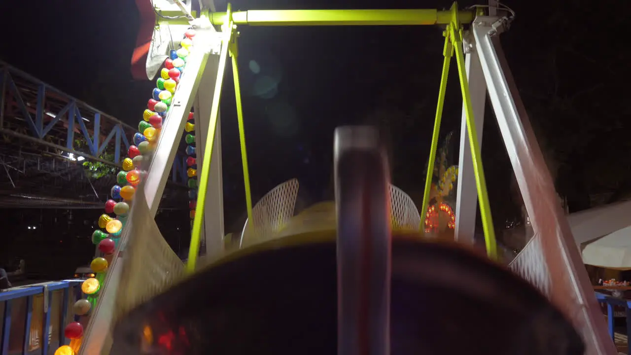 Child having pirate boat ride in amusement park