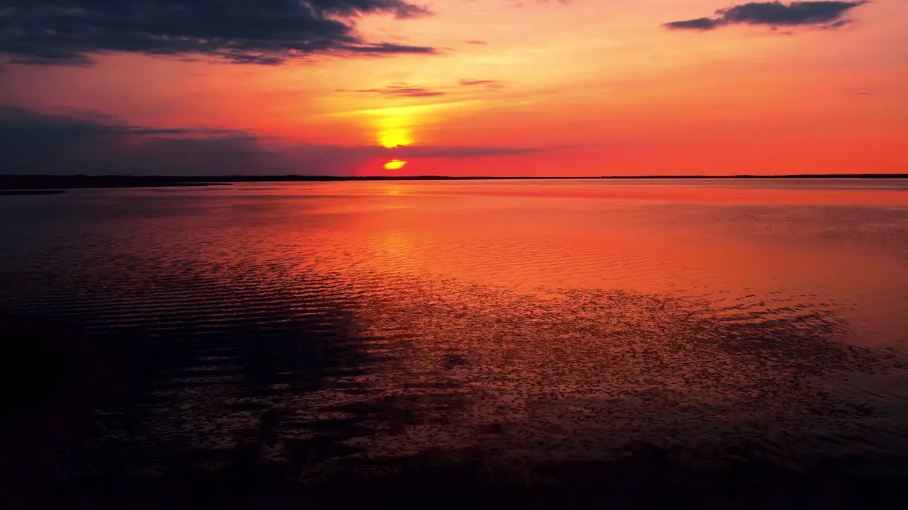 Red sunset by the lake