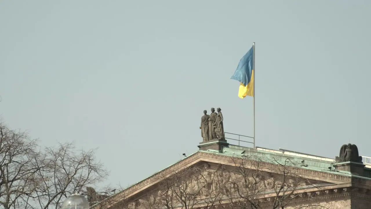 Flag of Ukraine on top of the Alte Nationalgalerie on the Museumsinsel in Berlin