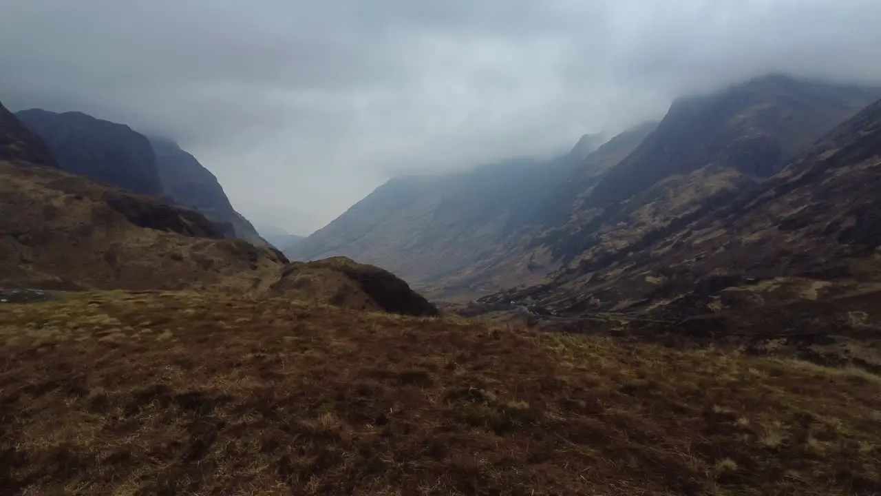 Cinematic drone video of Glencoe Valley with winter and autumn colours Scotland