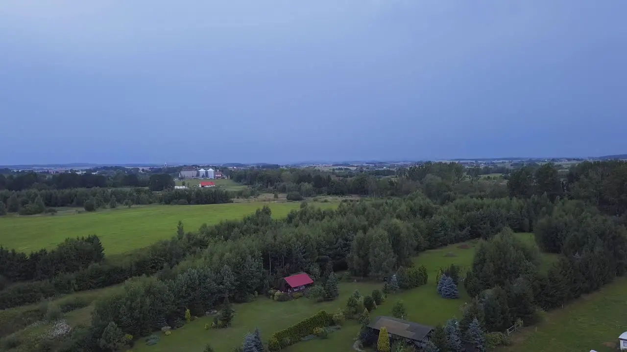 Aerial Shot of a Lightning Strike in a Distance over a Countryside