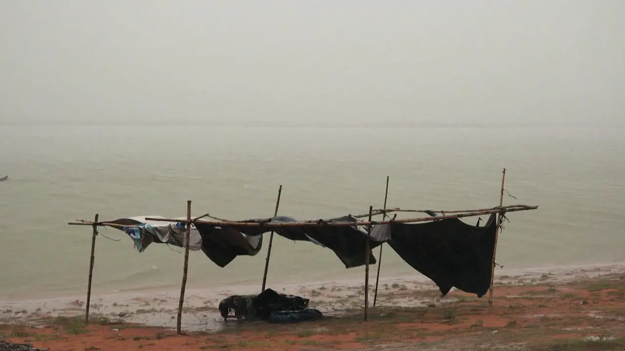 Fisherman in the Lake During Storm