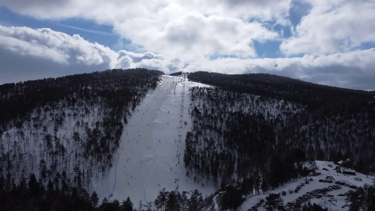 Drone fly over ski resort in winter time