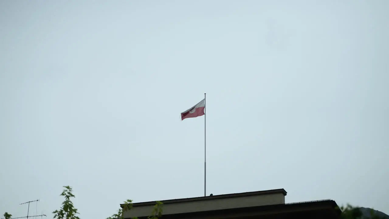 Flag Waving on a Building in Innsbruck Austria in Slow Motion