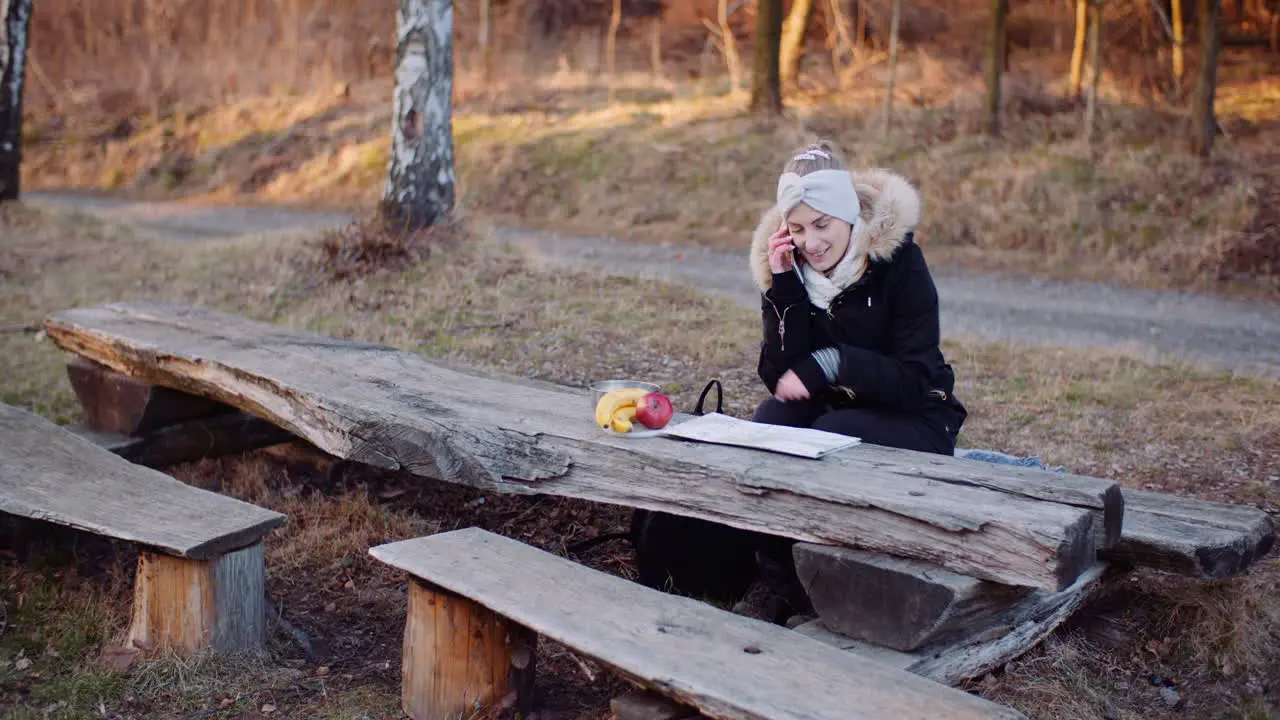 Female Tourist Writing Message On Smartphone 1