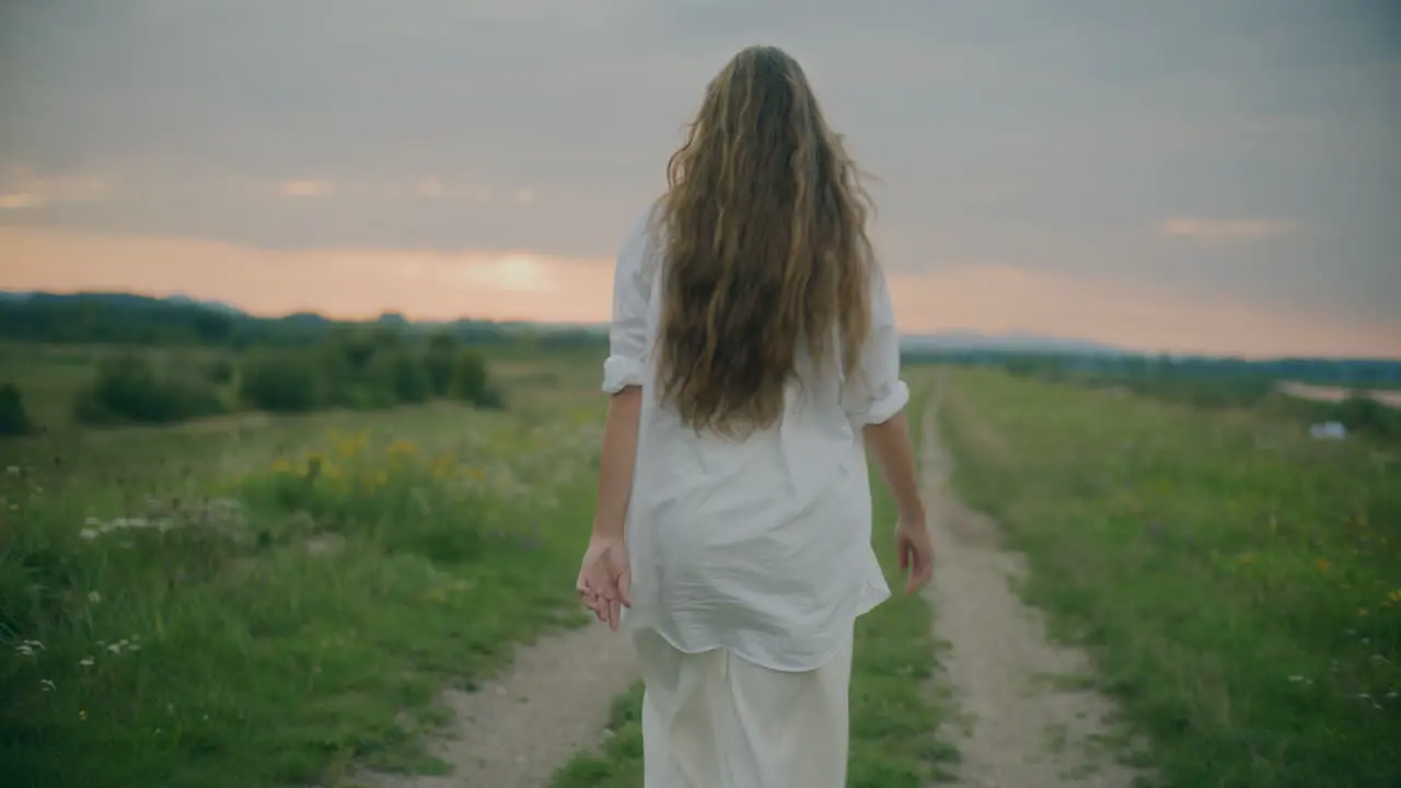 Smiling Woman Walking Outdoors