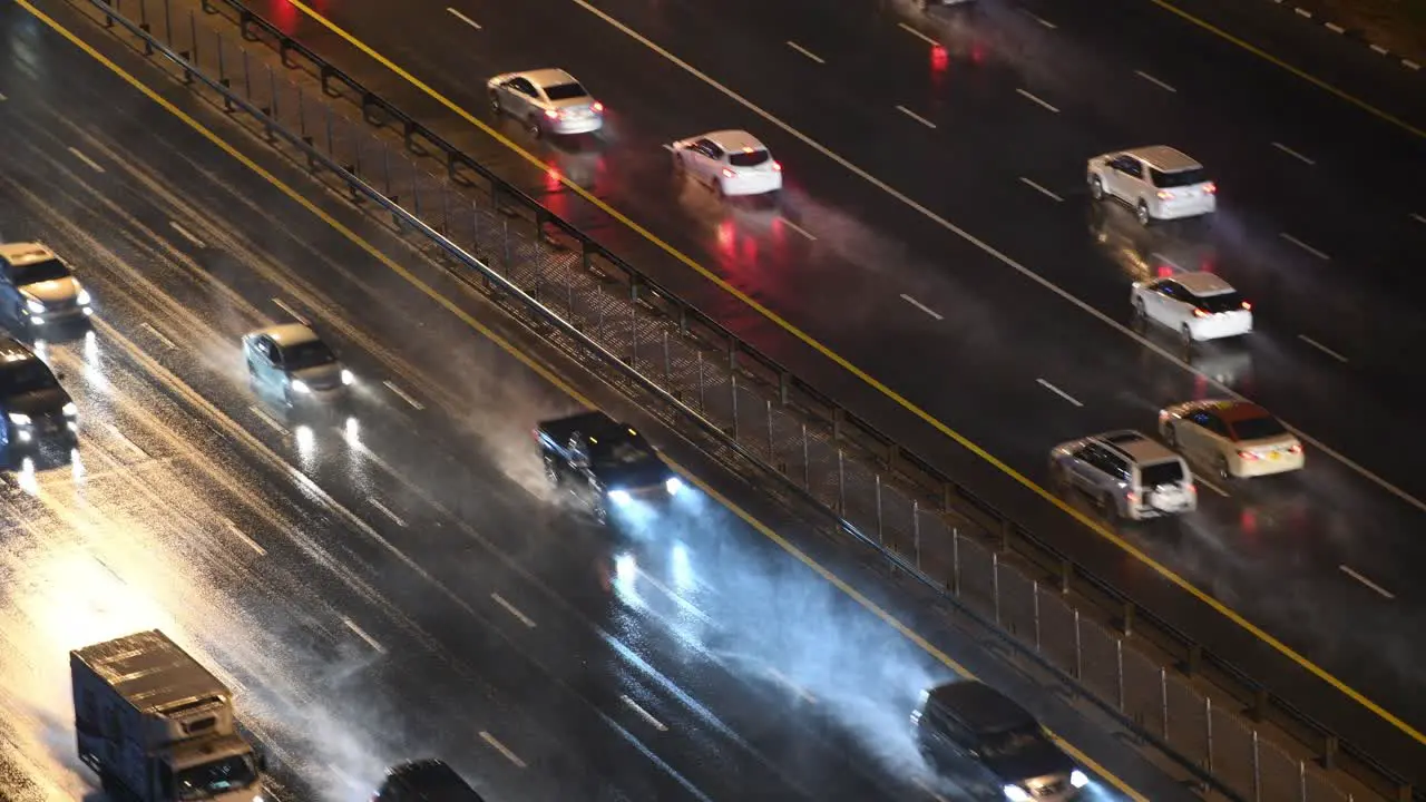 Cars driving on the highway during heavy rain