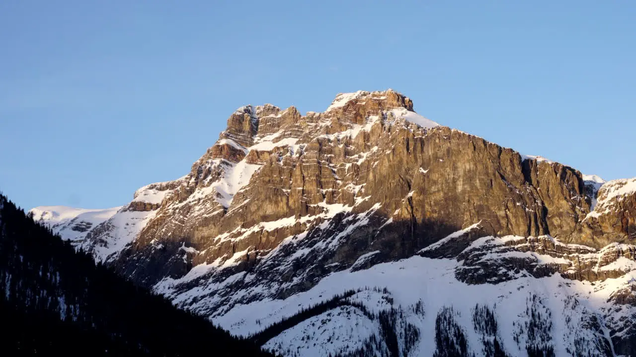 Mountain sunrise in Banff Alberta Canada on a calm winter morning with perfect light