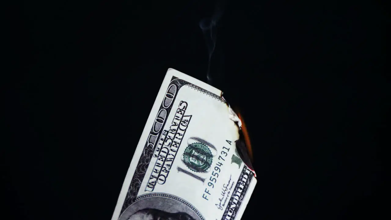 Close-up of euro dollar burning