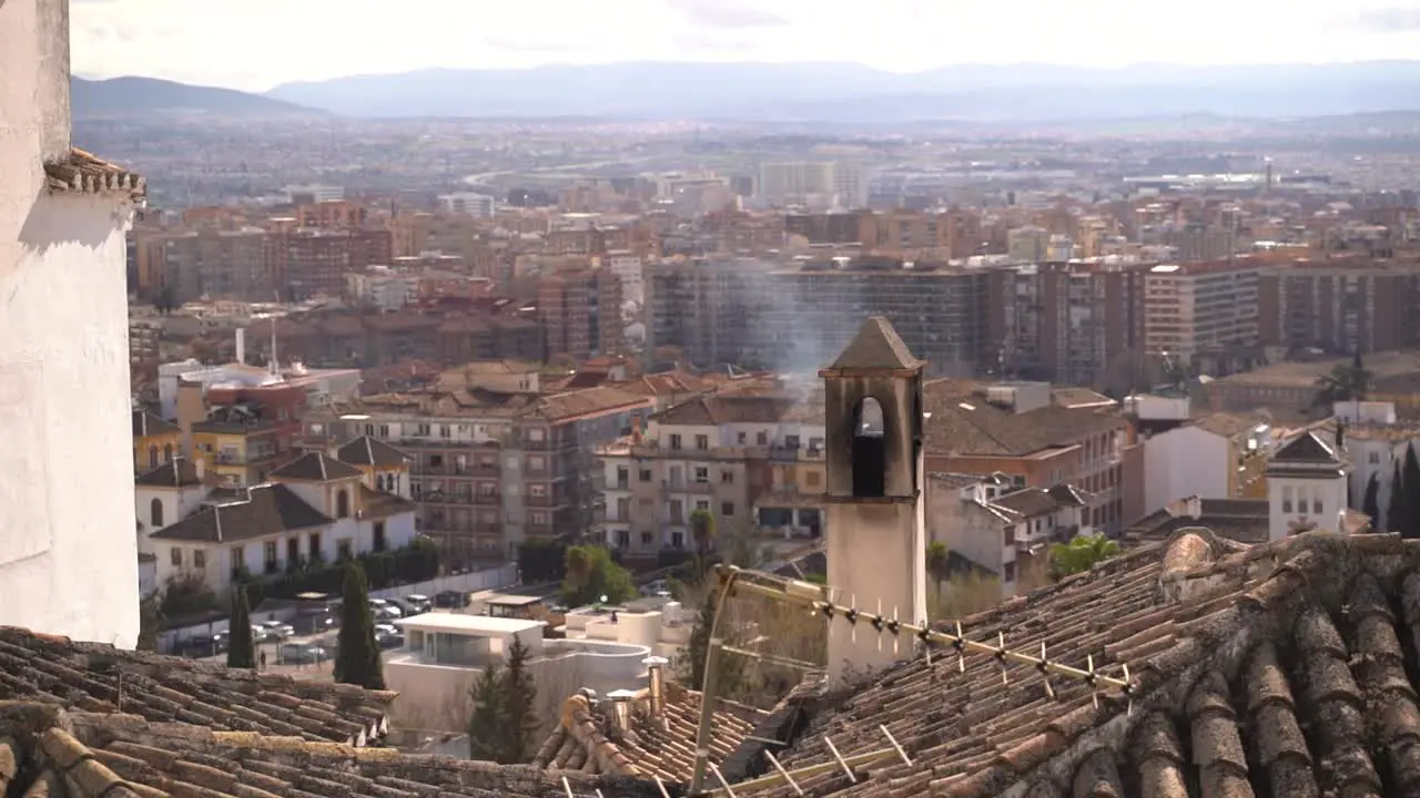 Chimney with smoke over city skyline Panorama view