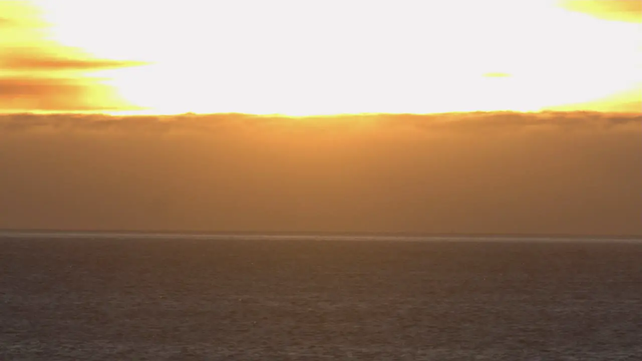 Low Flying Over ocean With Sunset View