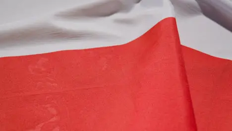 Close Up Studio Shot Of Polish Flag Filling Frame