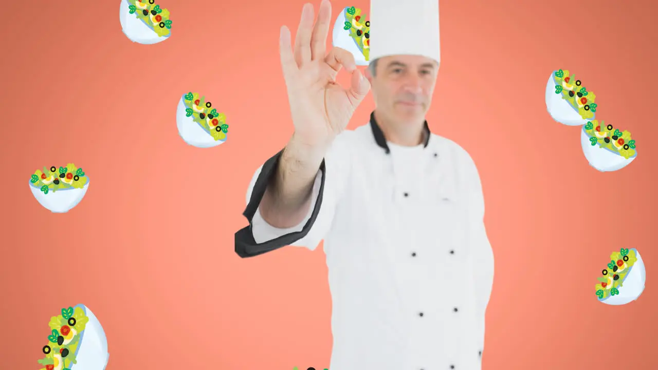 Animation of caucasian male chef over salad icons on orange background