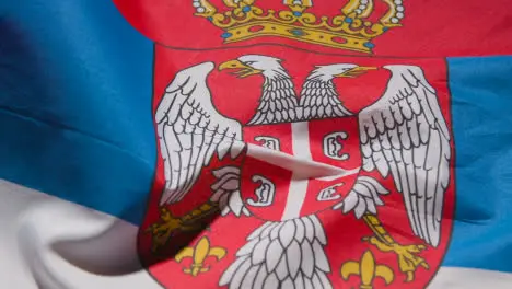 Close Up Studio Shot Of Serbian Flag Filling Frame