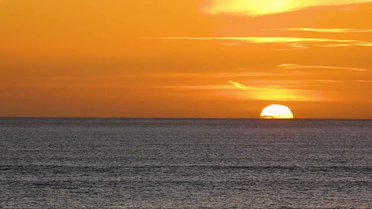 Fantasy sunset over seamlessly looped ocean