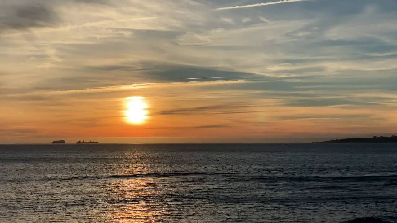 Forward motion footage of fiery sunset above the clouds in Lisbon Portugal for background