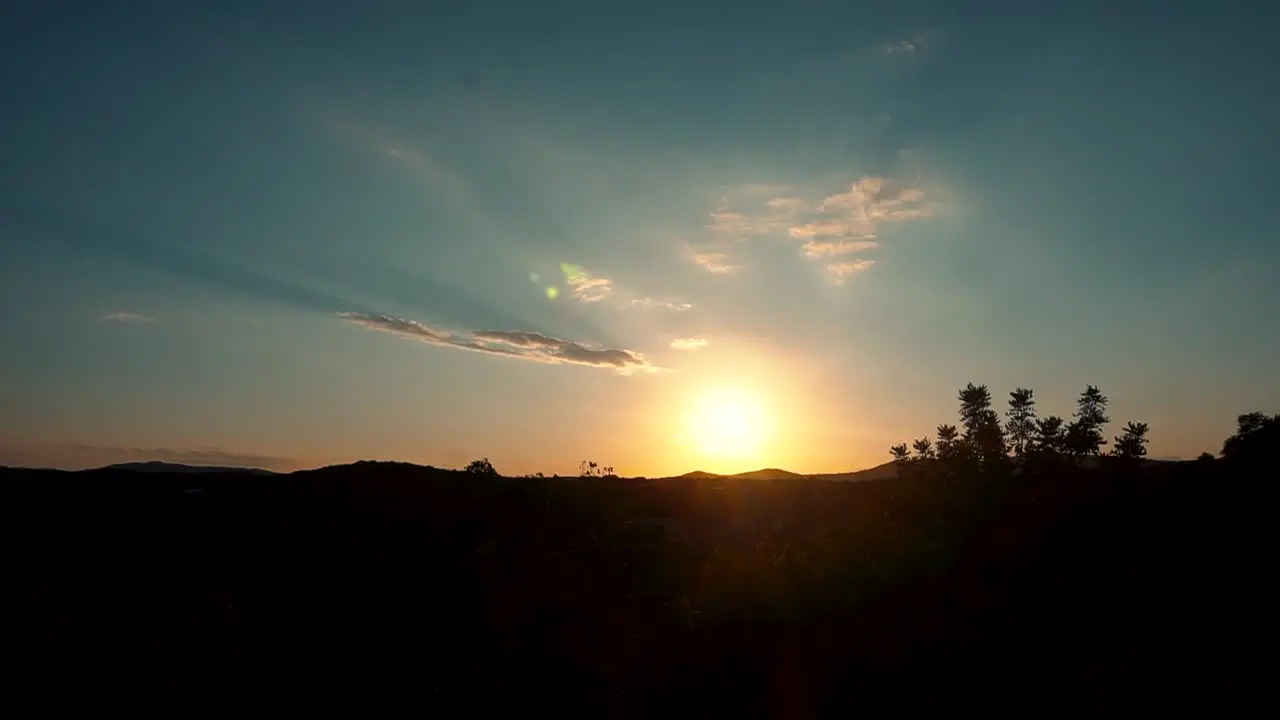 Scenic View Of Fiery Sunlight Over Mountain Peak During Sunset In Spain