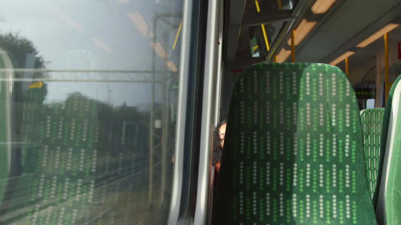 Woman sleeping on moving train