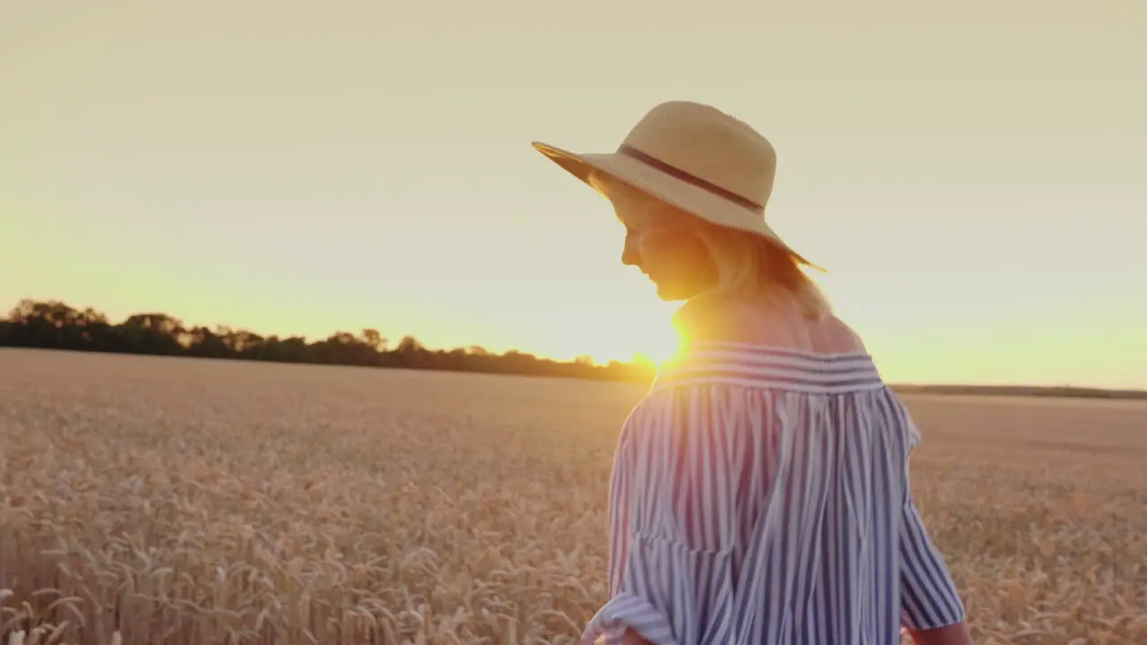 A Woman's Hand Holds A Man's Hand Leading To A Field Of Wheat 1