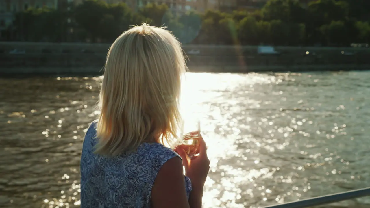 A Woman With Champagne On Board The Ship 2