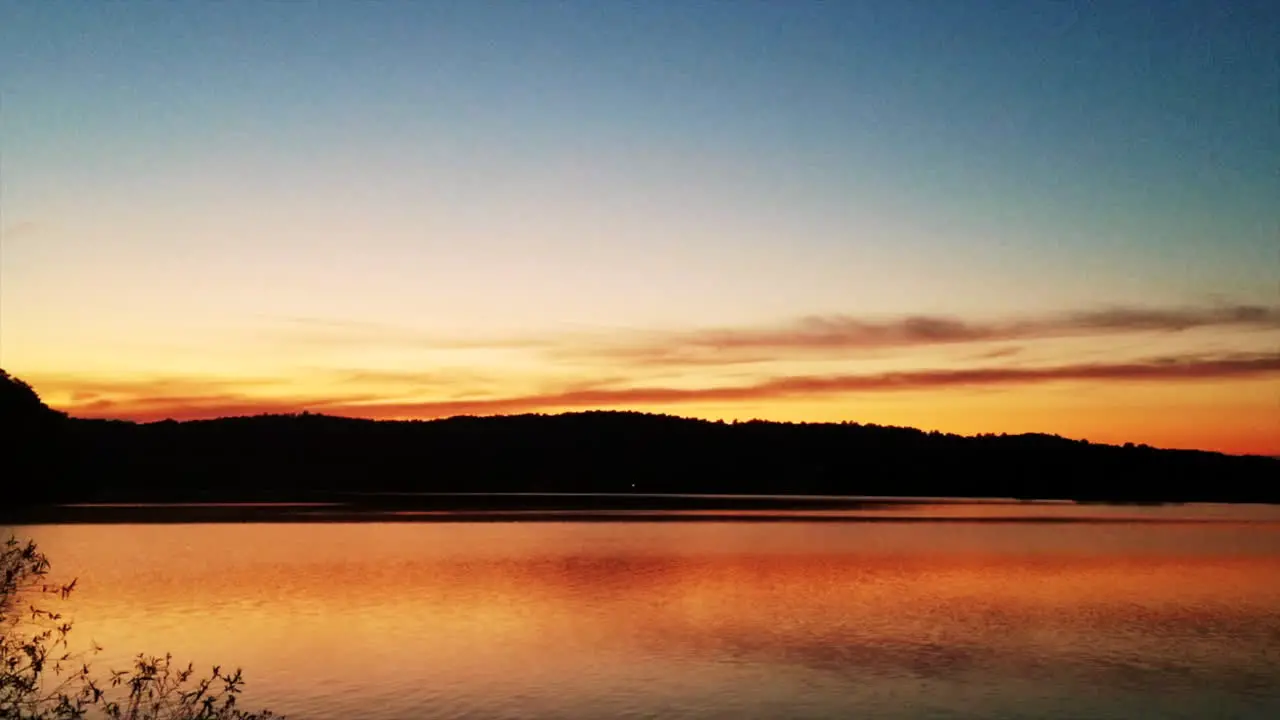 A beautiful colorful sunset over a tranquil lake