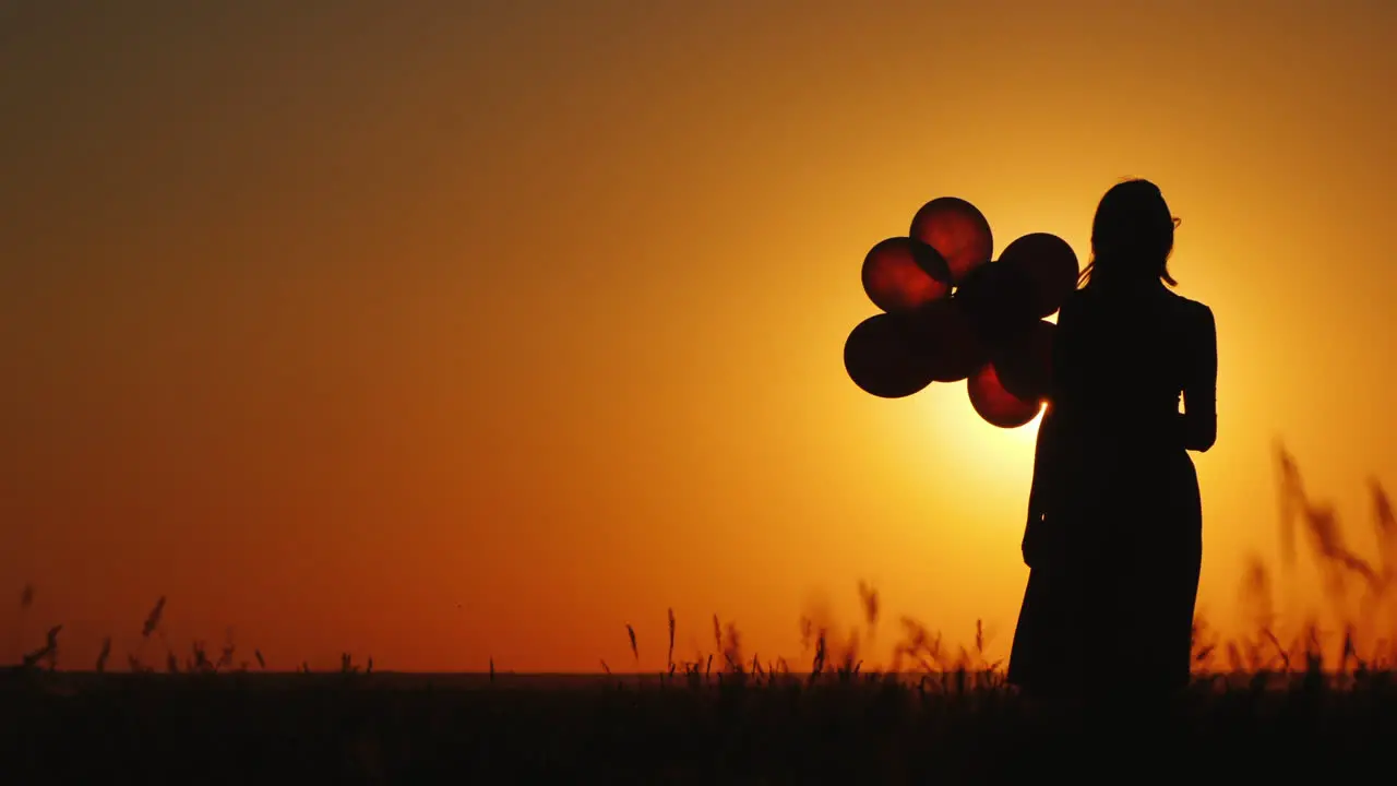 A Child Runs To His Mom Against The Backdrop Of A Beautiful Landscape At Sunset