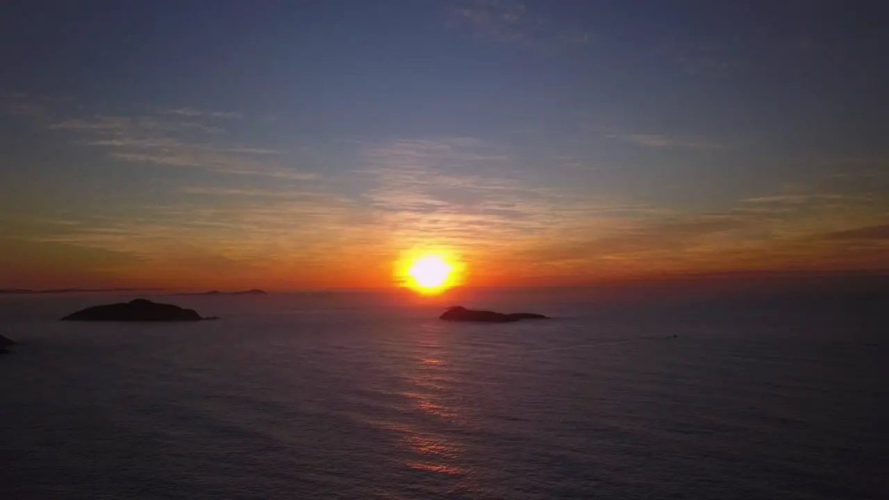 Very beautiful sunrise aerial flying over wild ocean in summer morning in Sydney nature from the peak of the mountain