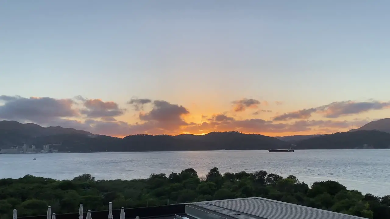 Sailboat enjoys the beautiful sunset at the southern most point of Huge River in high quality slow motion