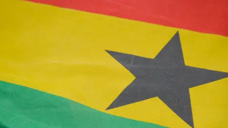 Close Up Studio Shot Of Ghanaian Flag Filling Frame