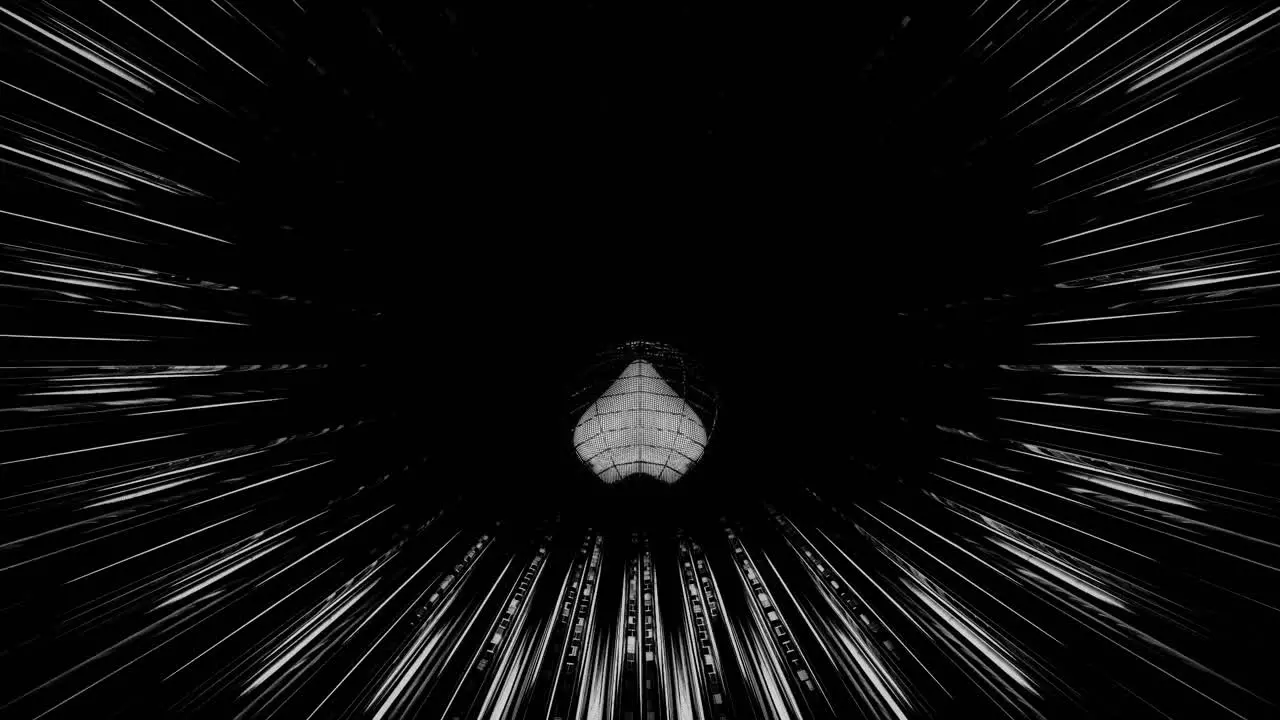 VJ Loop 3D Heart Rolling Along a Glowing Circular Black and White Tunnel