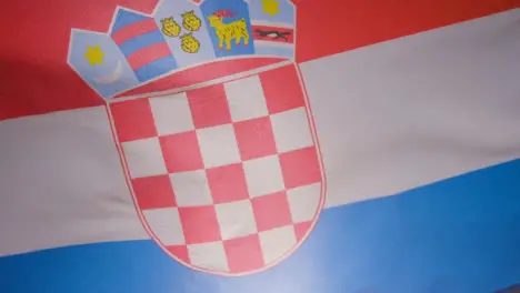 Close Up Studio Shot Of Croatian Flag Flying Filling Frame