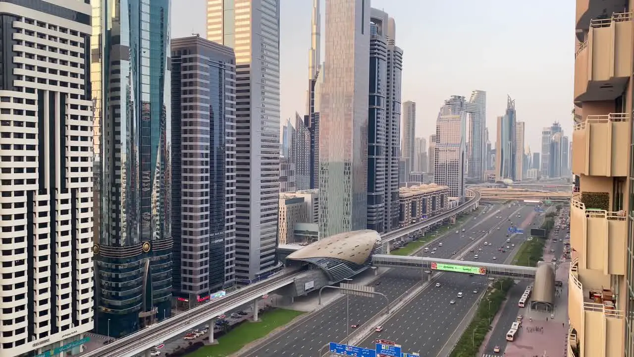 Sheikh Zayed Road in Dubai where cars flow seamlessly beneath the towering skyscrapers that grace the city skyline