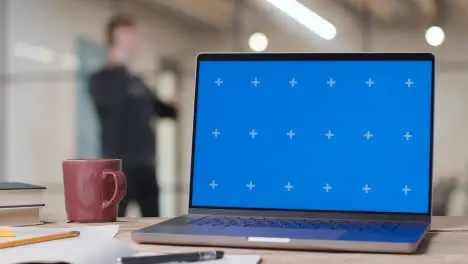 Blue Screen Laptop on Desk In University College Or School 1