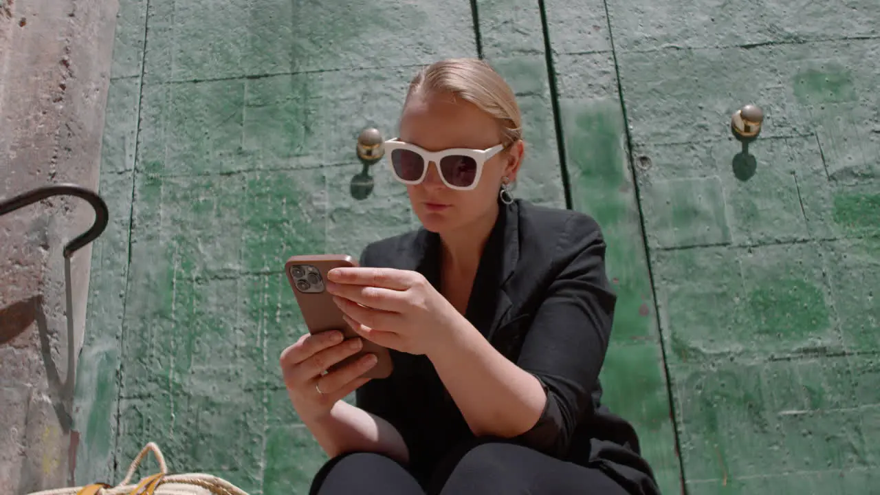 A young woman with a mobile phone