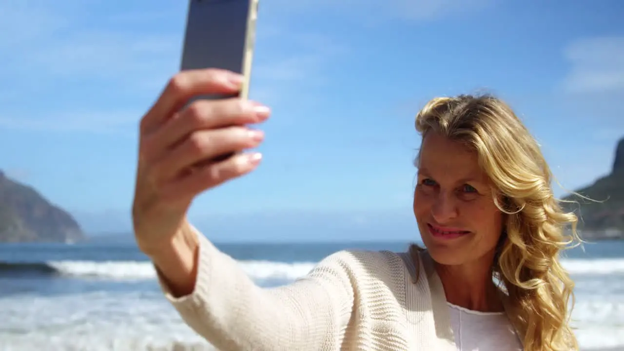 Mature woman taking a selfie from mobile phone