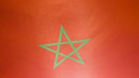 Close Up Studio Shot Of Moroccan Flag Flying Filling Frame