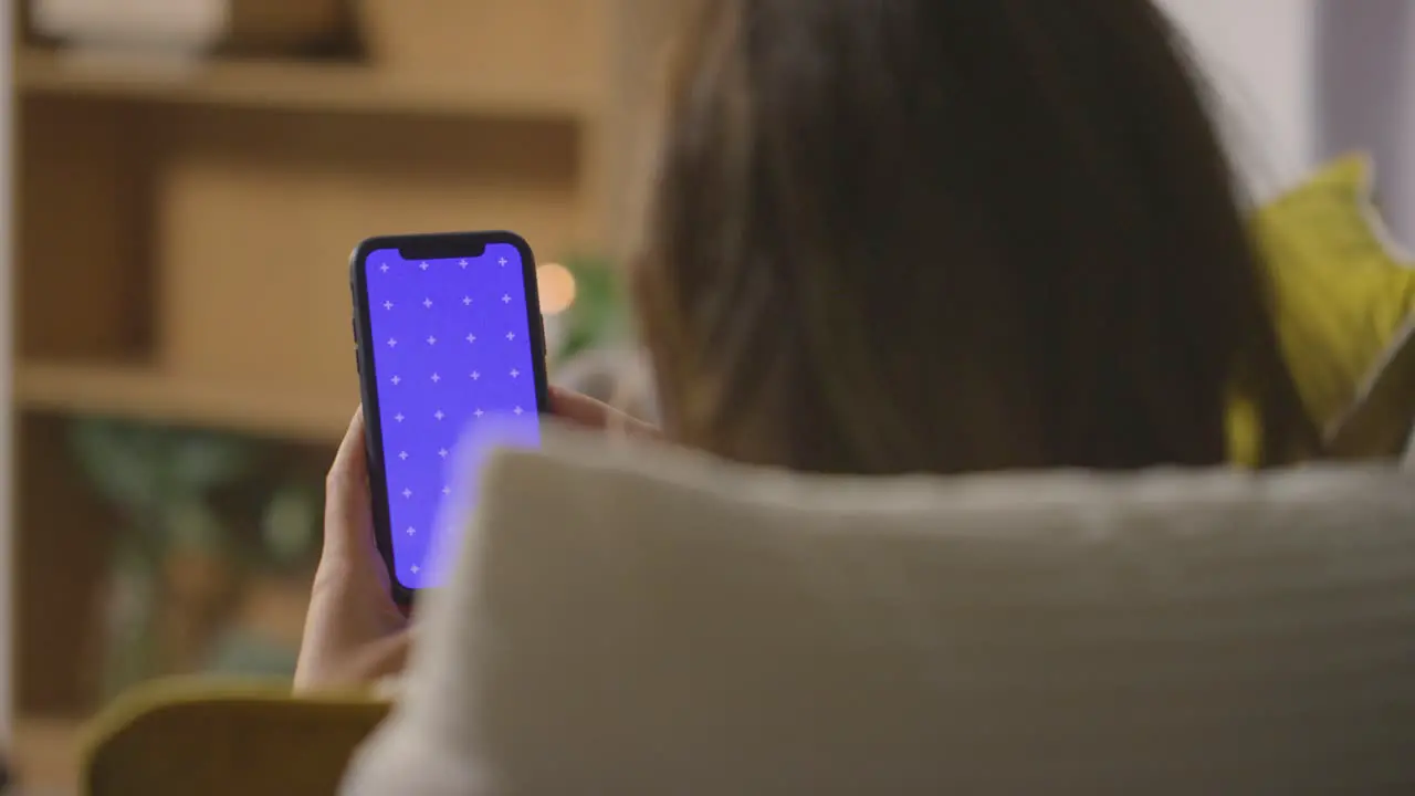 Close Up Of Woman At Home Shopping Online With Credit Card Using green screen blue Screen Mobile Phone 2