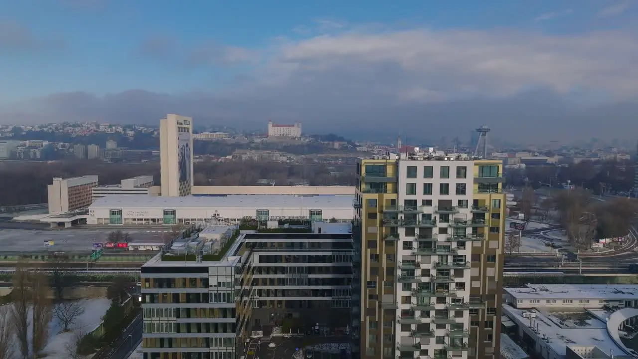 Aerial view of Bratislava Castle with Incheba Expo Arena in Winter on Sunny day