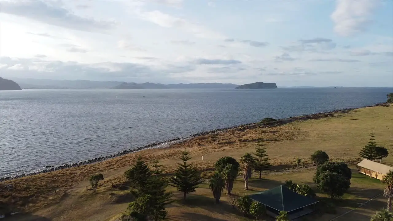 sunset time at the bay with golden light hour the sea and the land