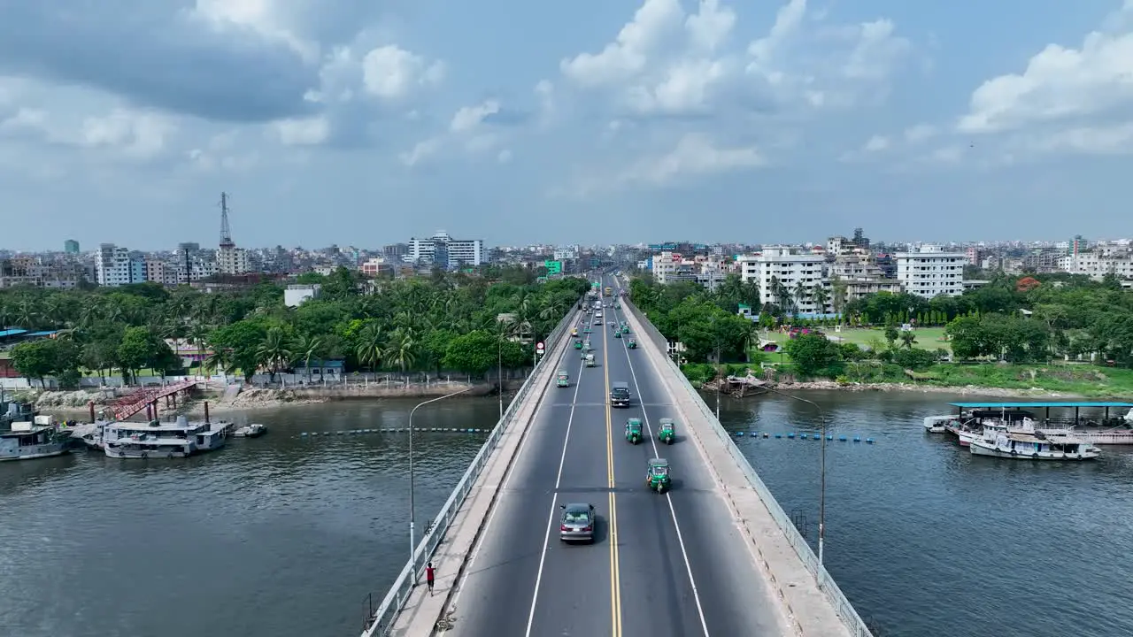 4k Drone video of vehicles passing on a bridge