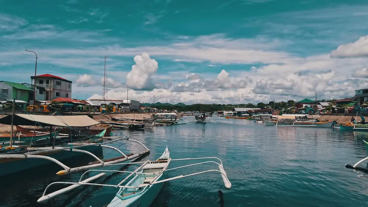 Banka boats commuting to the islands from the port of Surgao City Philippines