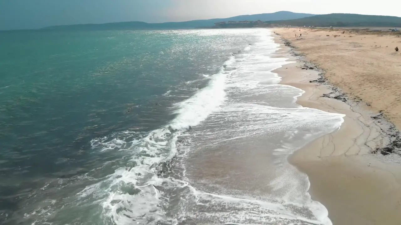 Seagulls take off from the seashore aerial drone footage in Sozopol Bulgaria