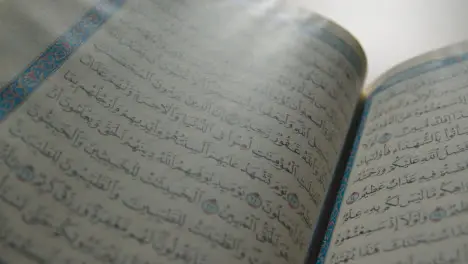 Handheld Shot of the Quran Pages