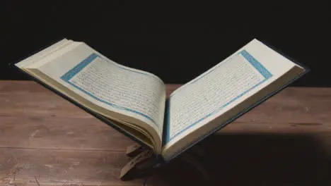 Handheld Shot of the Religious Text Quran 