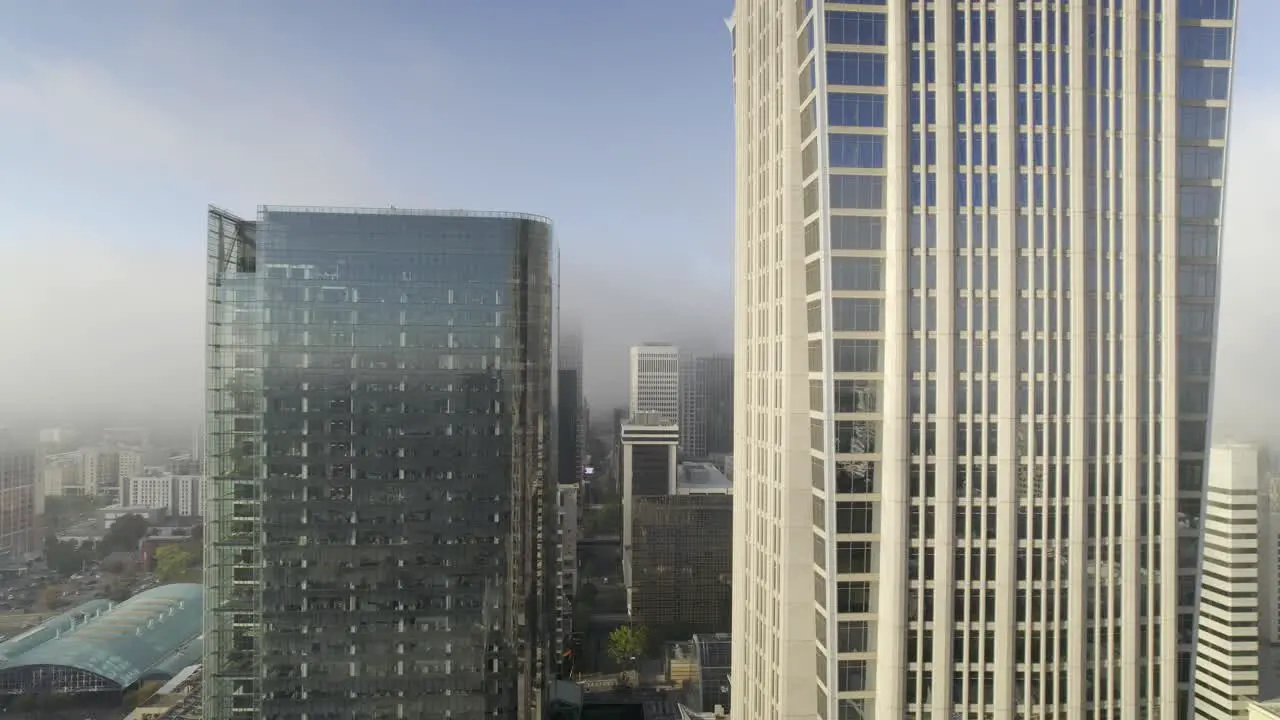 A view of skyscrapers on a foggy early morning in Charlotte NC