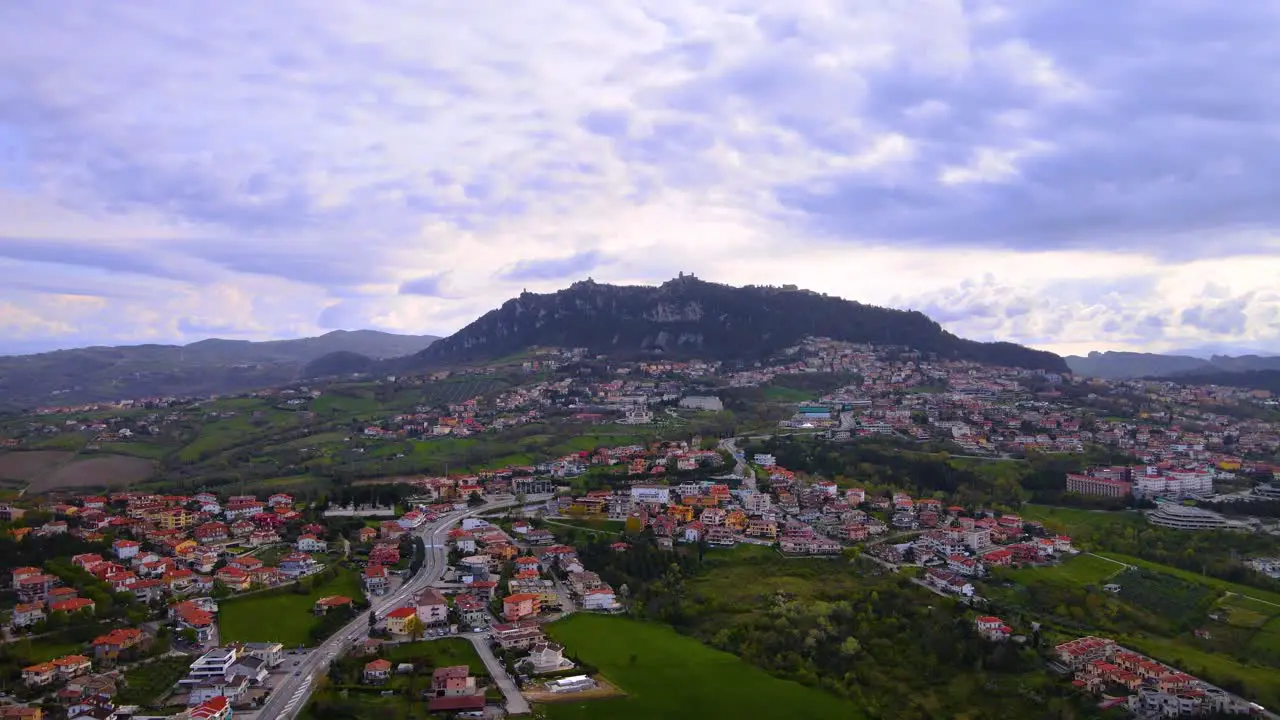 Drone shot flying over San Marino towards the Monte Titano and the Città di San Marino