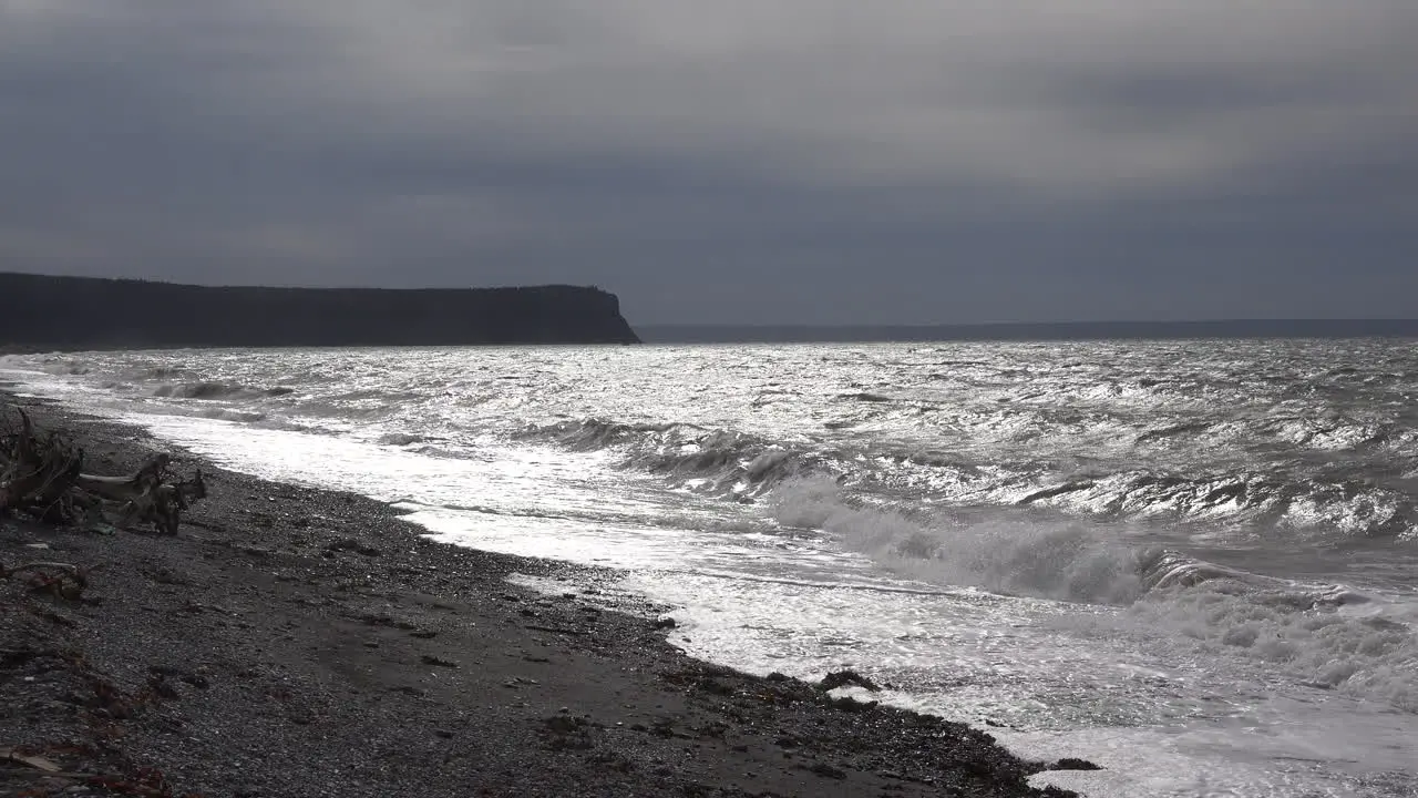 Canada Bay Of Fundy Sun On Water Under Dark Sky