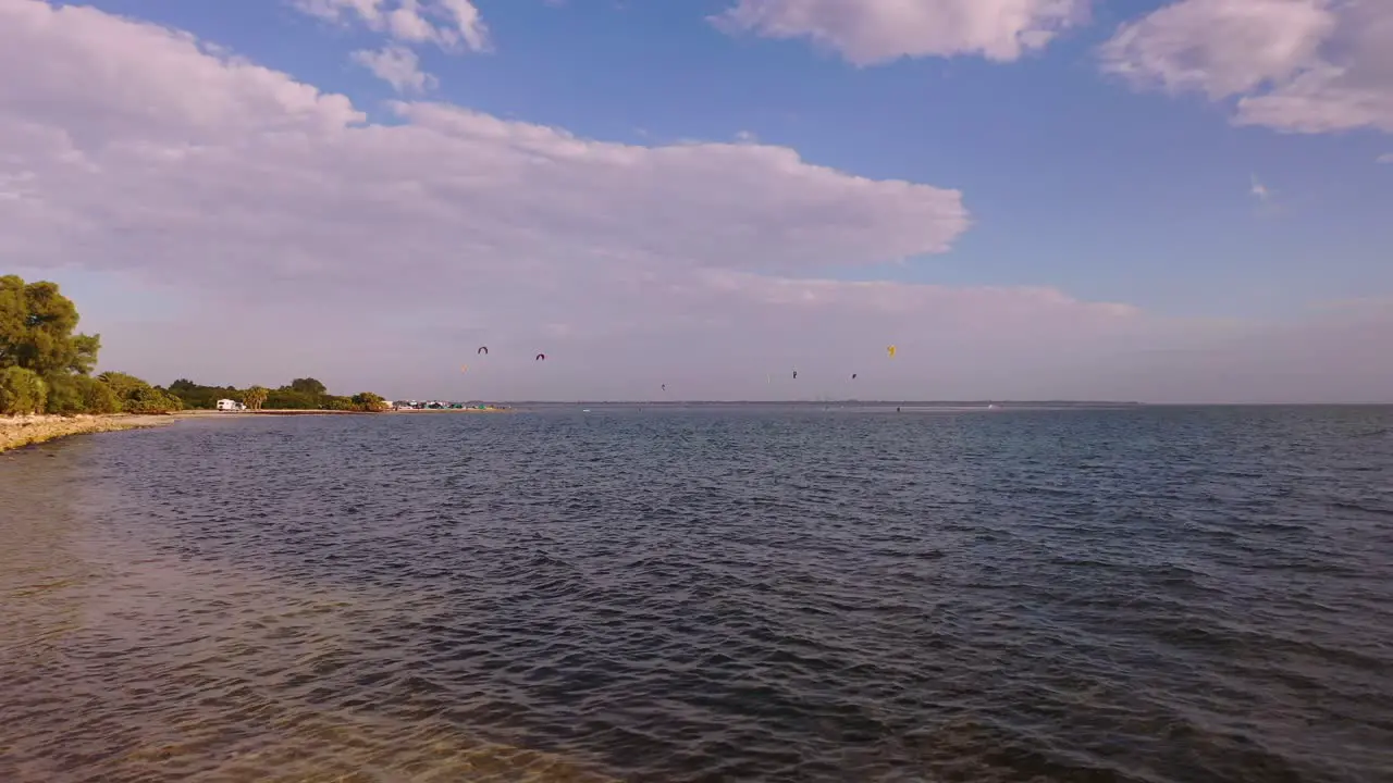 Kite surfers Wind surfers having fun in Tampa Bay Florida